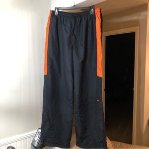 Nike wind breaker track pants.